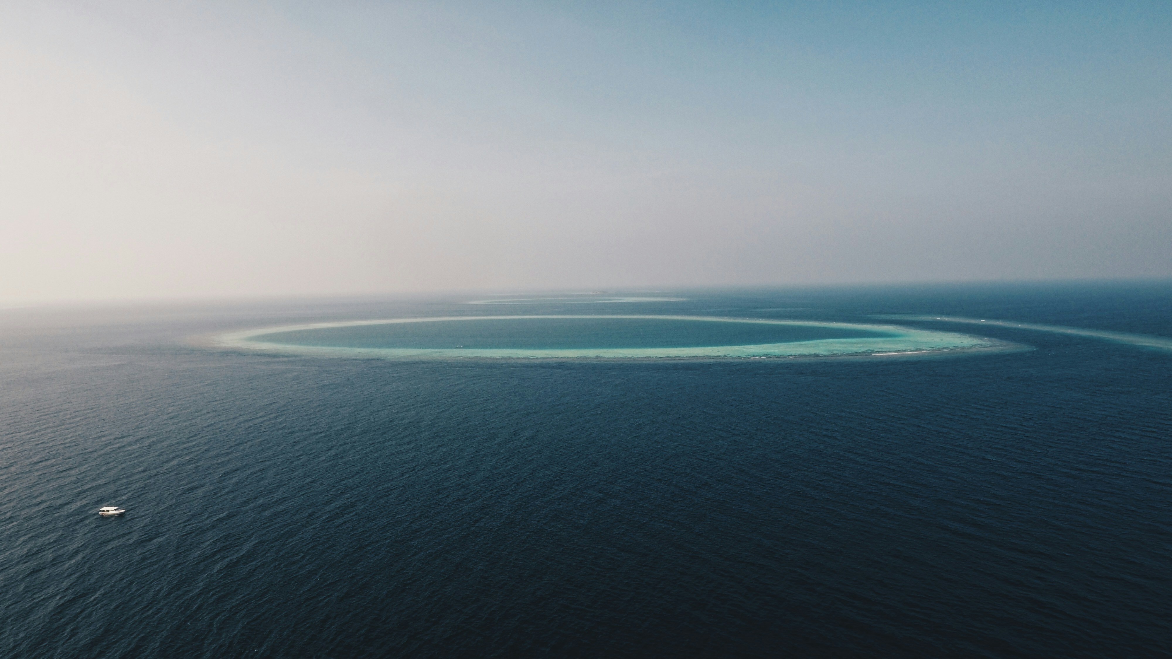 aerial view of island and ocean, Atoll.