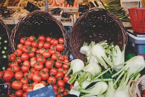 A basket overflowing with colorful seasonal vegetables ready for market