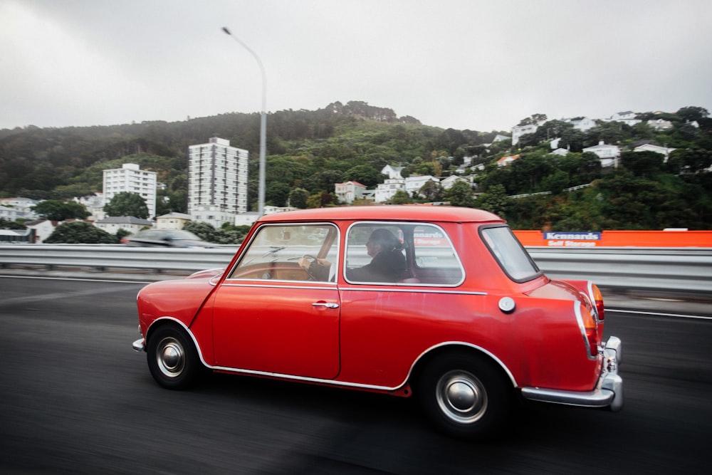 red car in the road