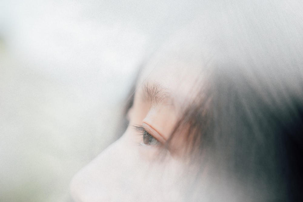 closeup photography of woman with black hair