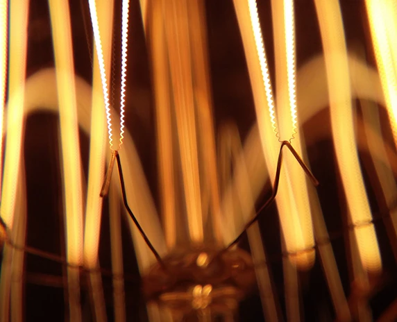 Close-up of a high-tech motor component with glowing energy lines.