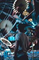 man standing near amusement park during daytime