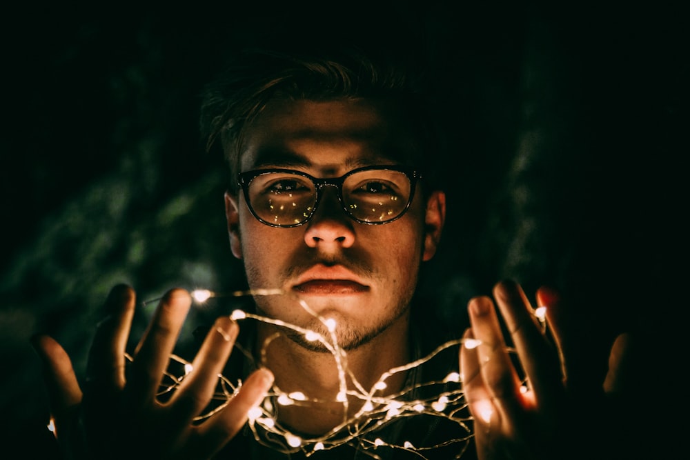 man wearing black eyeglasses