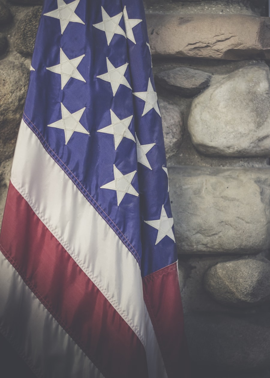 The American flag waving against a clear sky