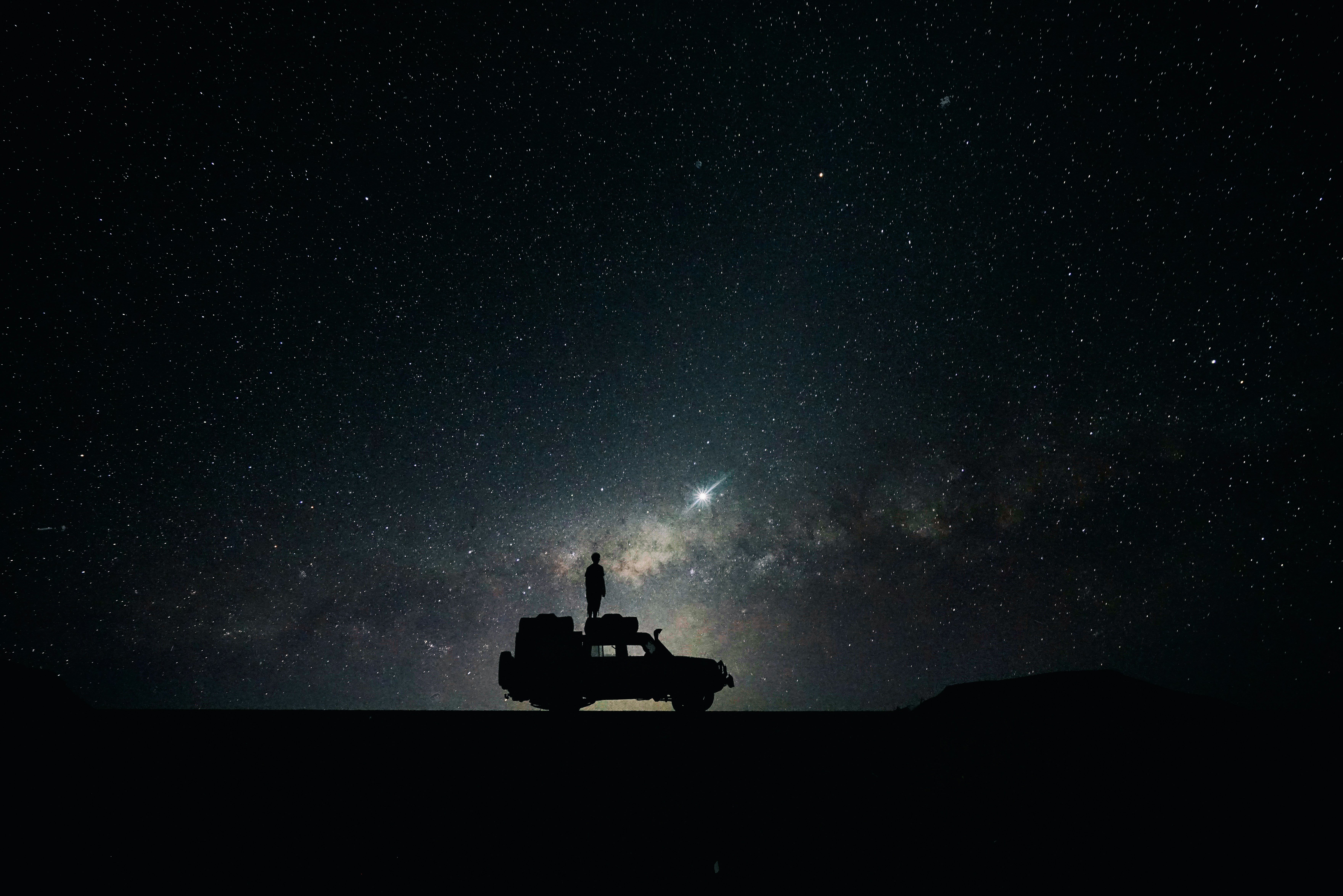 Long exposure selfie, standing on a car and remotely triggering the camera on a nice warm and dark night