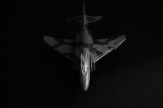 Collection of various aircraft models displayed on a minimalist grey background.