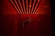 red marquee light going right