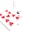 A spread of playing cards on a white background, prominently featuring the red hearts from a deck, including a close-up of the ten of hearts. The cards are arranged in an overlapping pattern with numbers and suits visible.