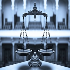 Graphic showing a balance scale symbolizing risk versus reward.