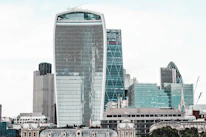 A sleek city skyline showcasing premium residential and commercial buildings.