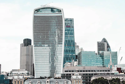 A sleek city skyline showcasing premium residential and commercial buildings.