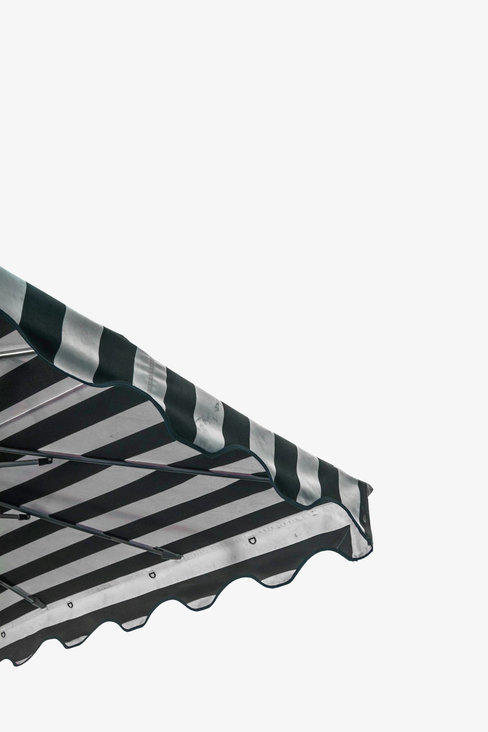 white and black striped canopy tent