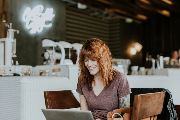 Person sitting reflectively at a café