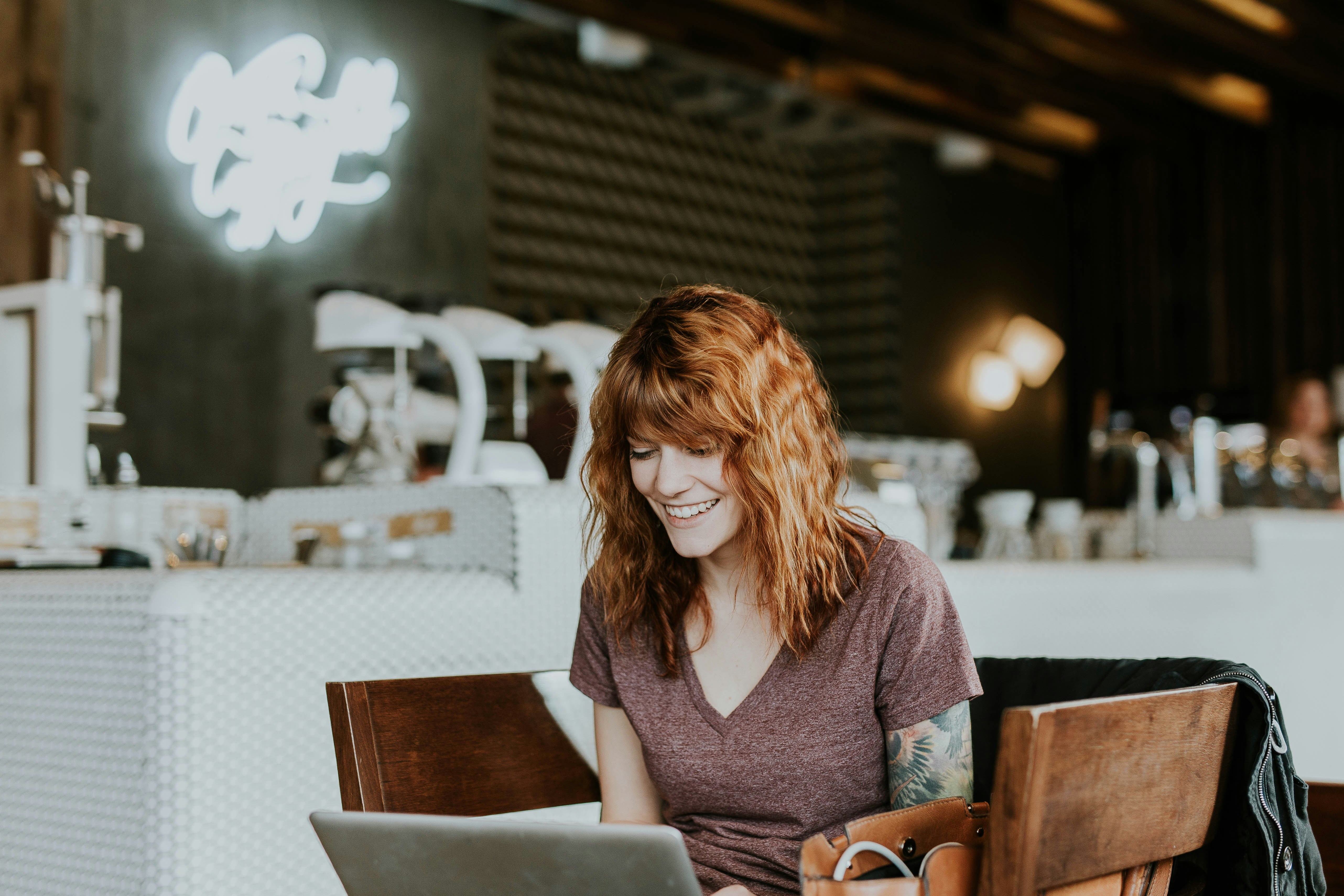 &quot;Tattooed woman with laptop&quot;