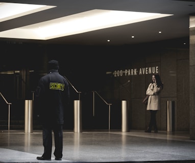 security guard standing on the gray floor