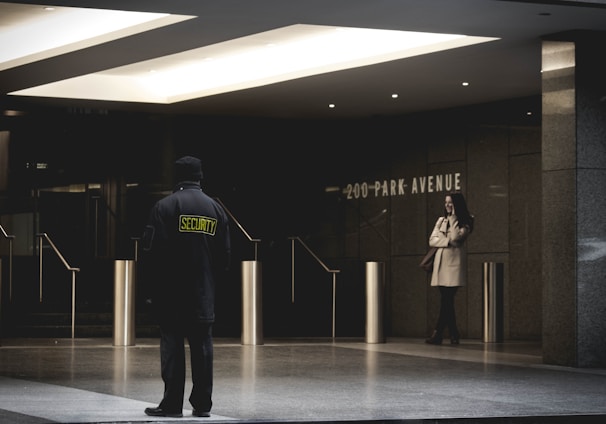 security guard standing on the gray floor