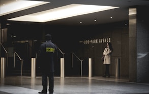 security guard standing on the gray floor