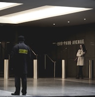 security guard standing on the gray floor