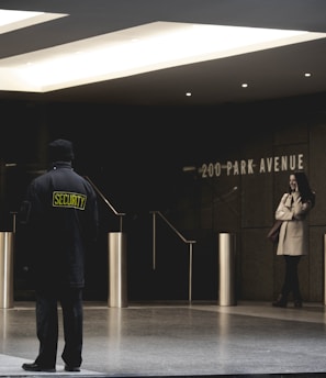 security guard standing on the gray floor