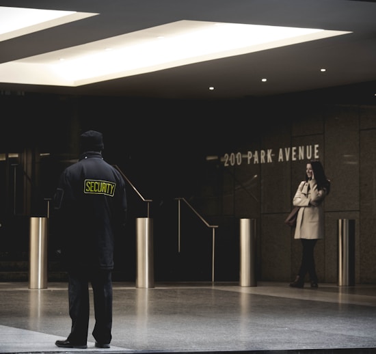 security guard standing on the gray floor