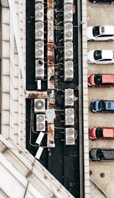 aerial photo of air condenser units and cars