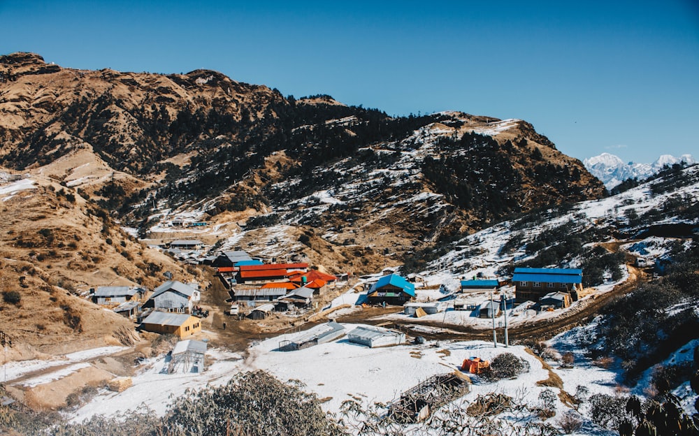 houses on mountain during daytime