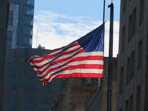 A vibrant image of the American flag waving in the wind.