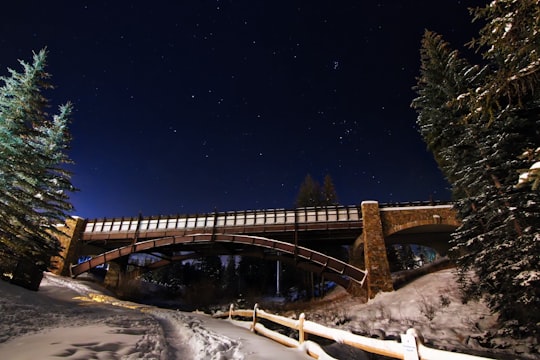 brown bridge during nighttime in Vail United States