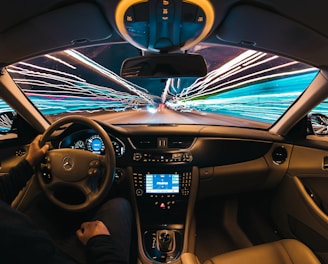 time lapse photography of man riding car