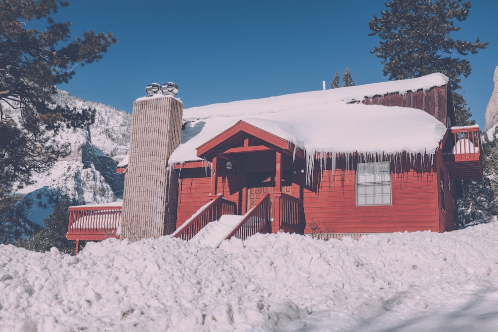 snow capped red building