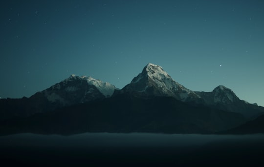 silhouette of mountains during nigh time photography in Annapurna Nepal