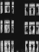 mannequin in front of windows