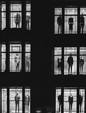 mannequin in front of windows