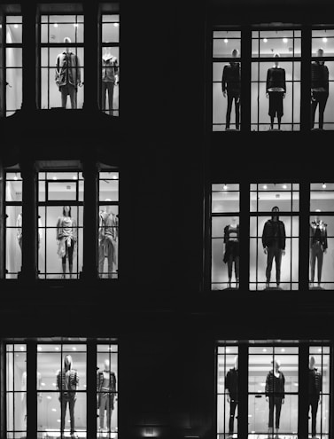 mannequin in front of windows