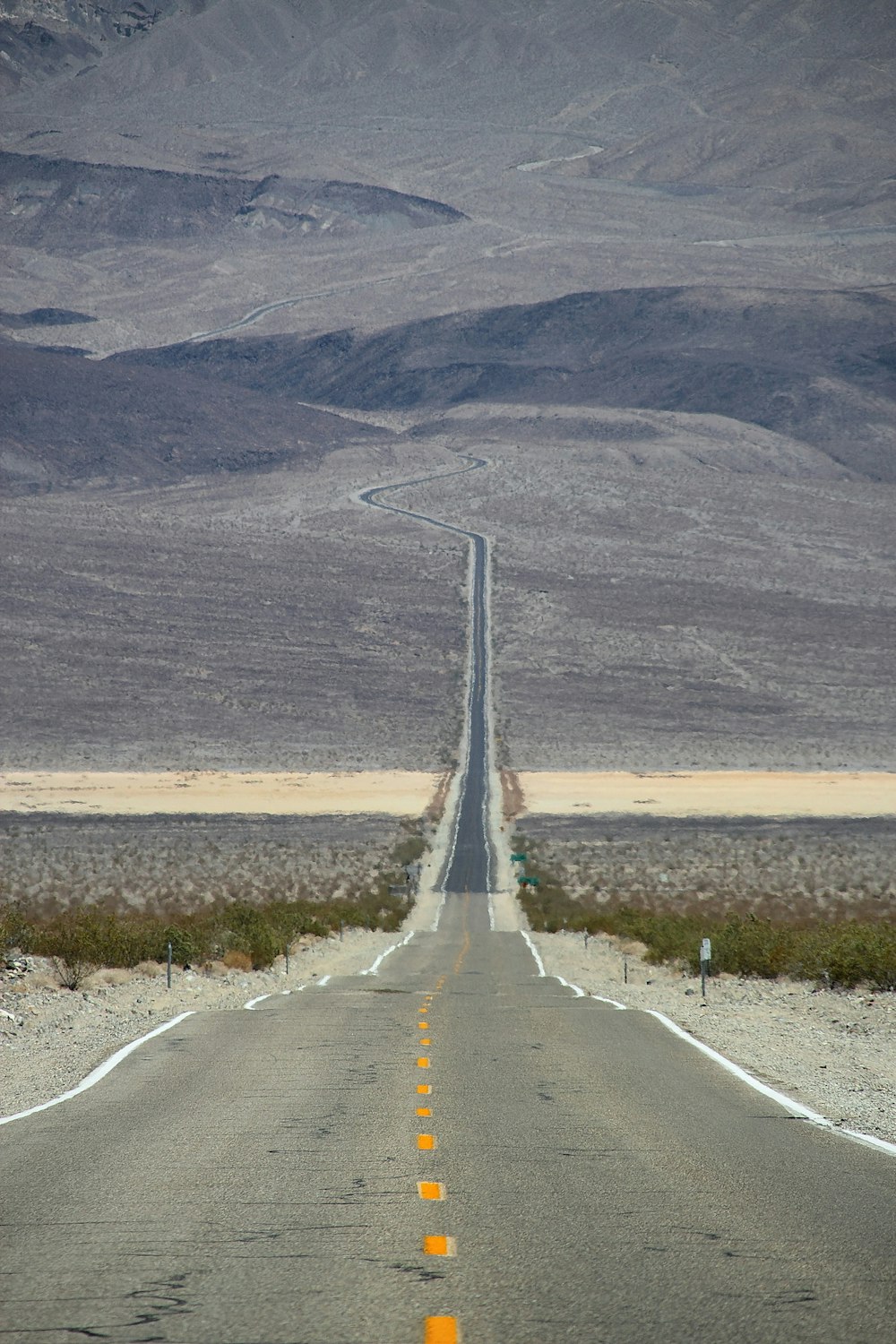 empty road along mountain