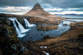 rock formation surrounded with water