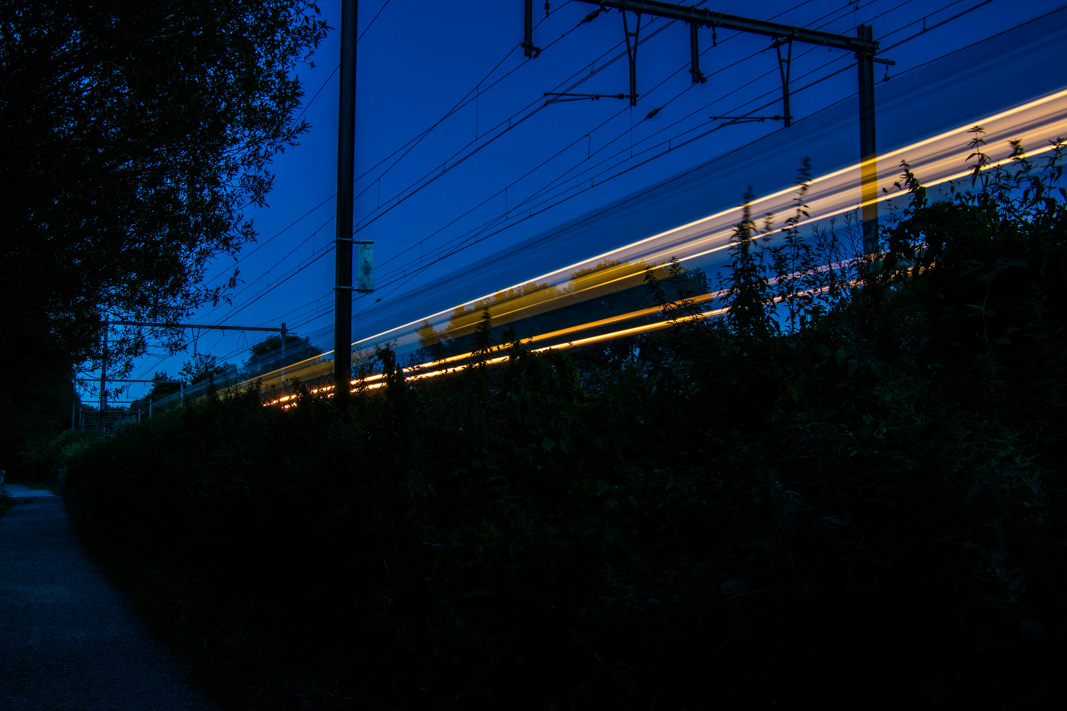 time lapse photography of train rail