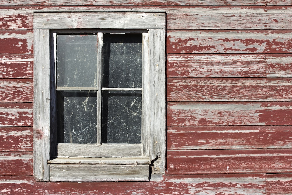 4-panel glass window with gray wooden frame