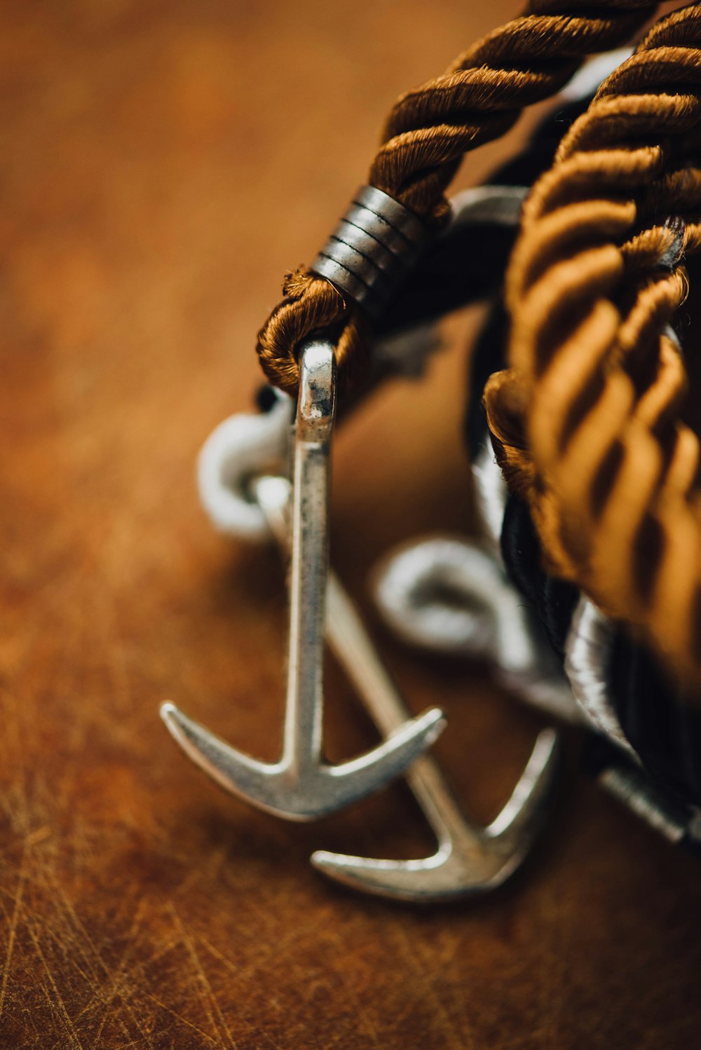 silver-colored anchor accessory