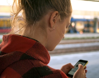 woman holding phone