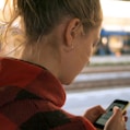 woman holding phone