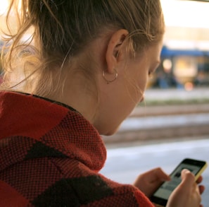 woman holding phone