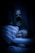 A dimly lit scene features a young person sleeping peacefully in the foreground, with their head resting on a pillow. A figure with long hair stands ominously in the background, their face partially obscured by darkness, contributing to an unsettling atmosphere.