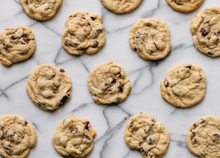 baked cookies on white concrete surface