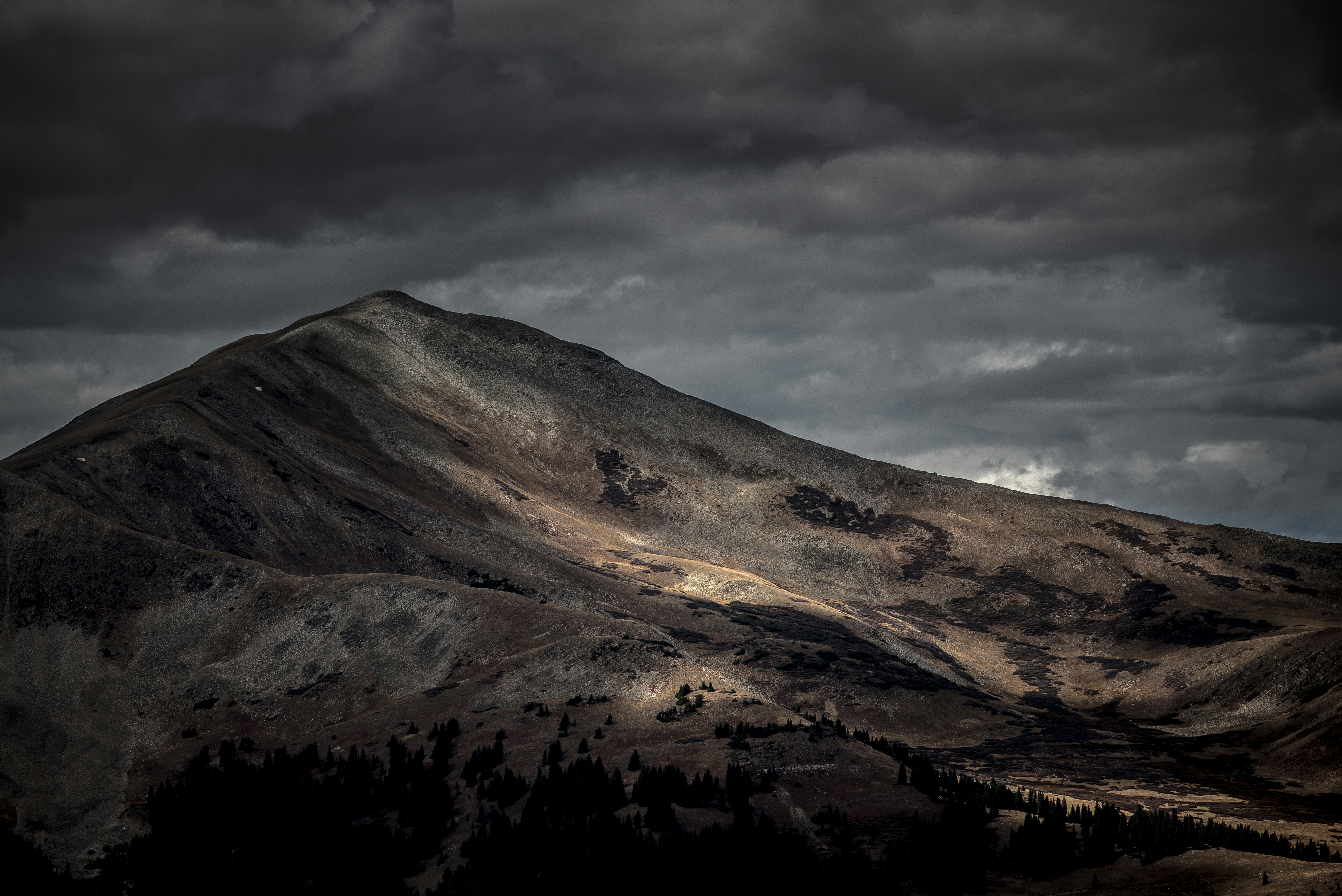 brown mountain under gray sky mayflower teams background