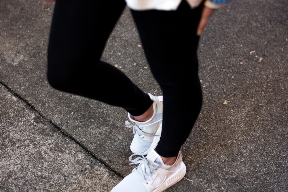 person wearing white Adidas NMD sneakers photo – Free Image on Unsplash