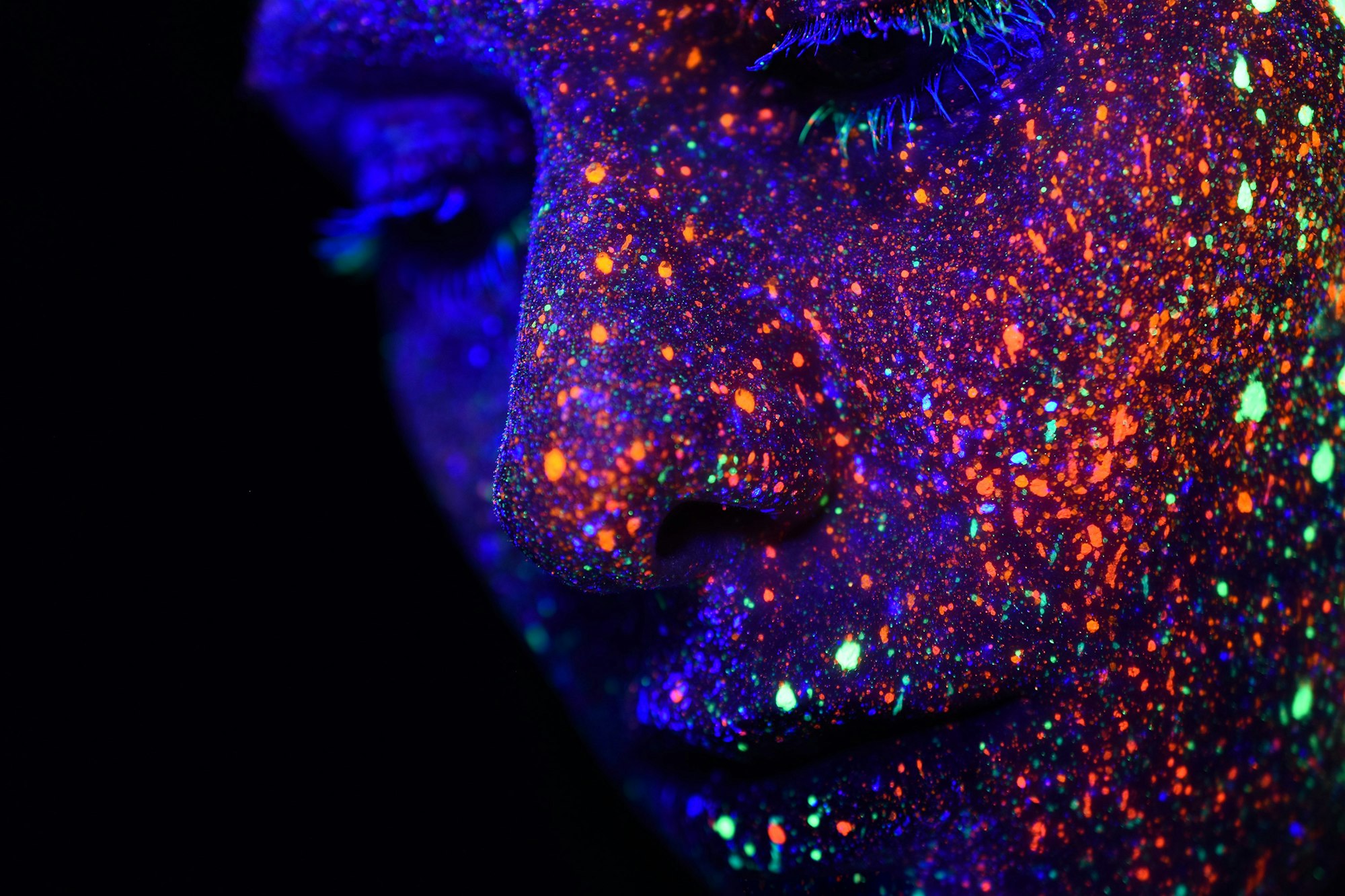 https://unsplash.com/@ic03r was inspired by some blacklight photographs he found on pinterest. We suggested that we could use the colors as sparcles to create a stunning galaxy feel. That is the outcome. We plan to do another series following real star signs on face and body.