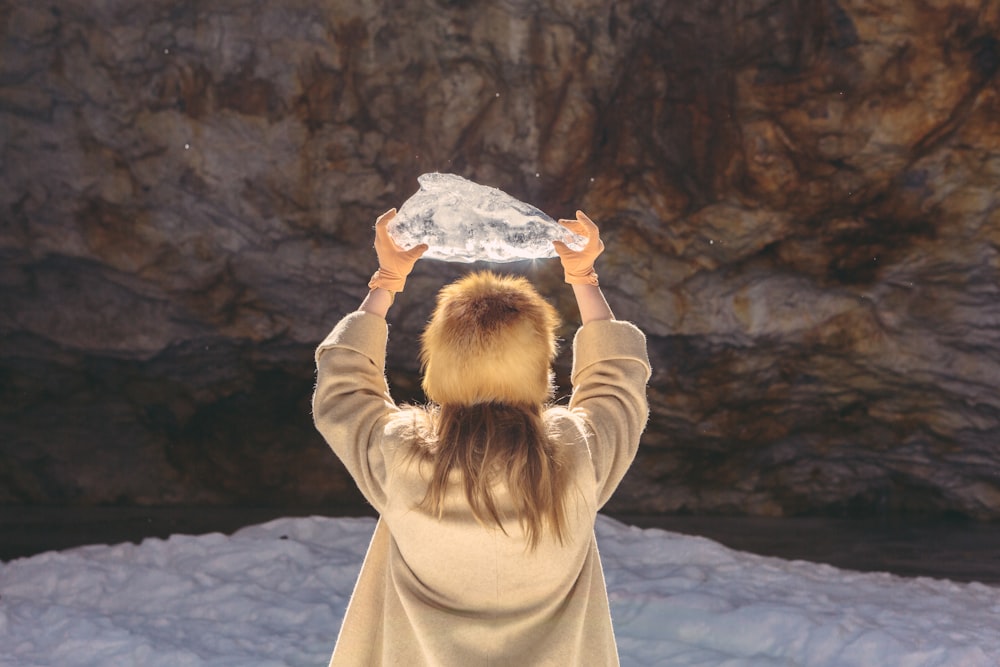 person carrying block of ice