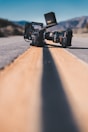black shoulder-held camcorder on road
