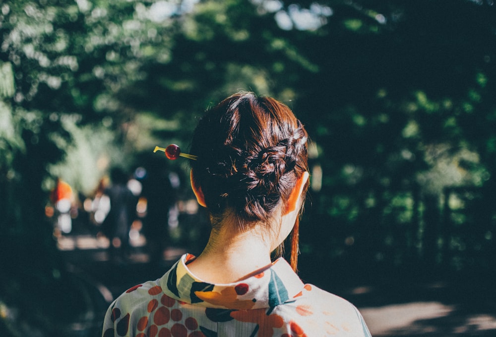 woman with brown braided hair